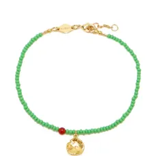 Браслет с бусинами и подвесками Браслет с бусинами и подвесками