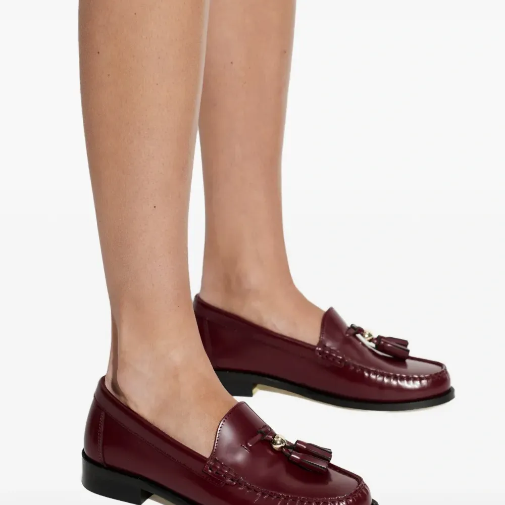 Лоферы с кисточками