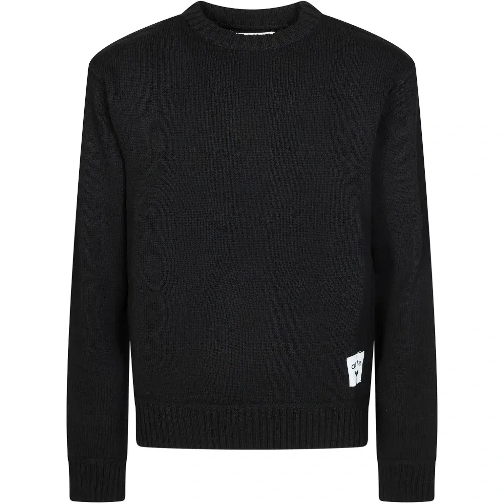 Свитер с круглым вырезом