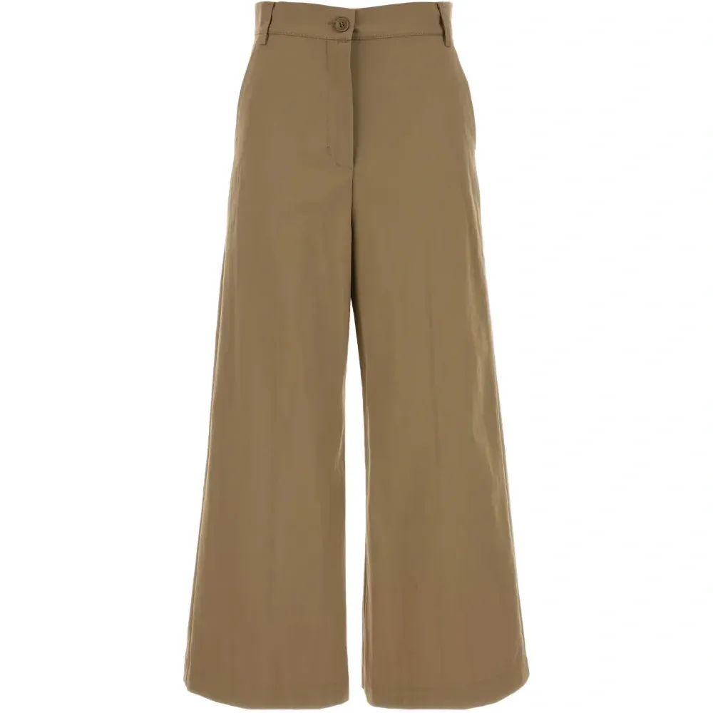 Брюки с клапанами на карманах