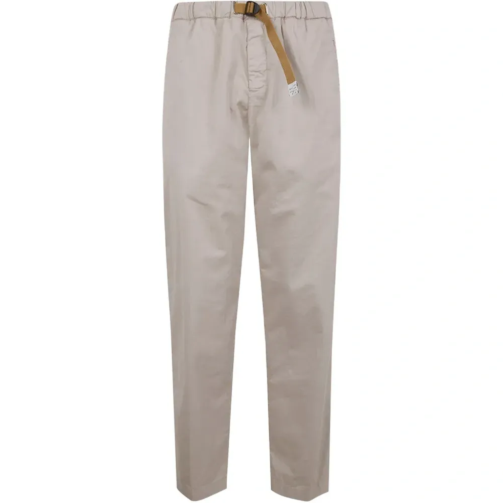 Брюки с карманами и пряжками