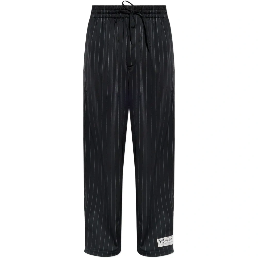 Спортивные брюки в полоску на кулиске