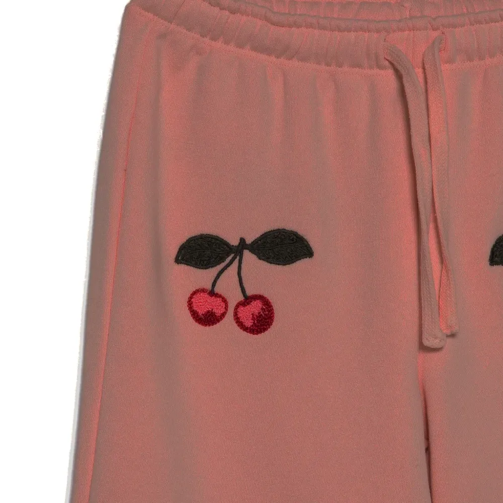 Брюки с вышивкой вишен