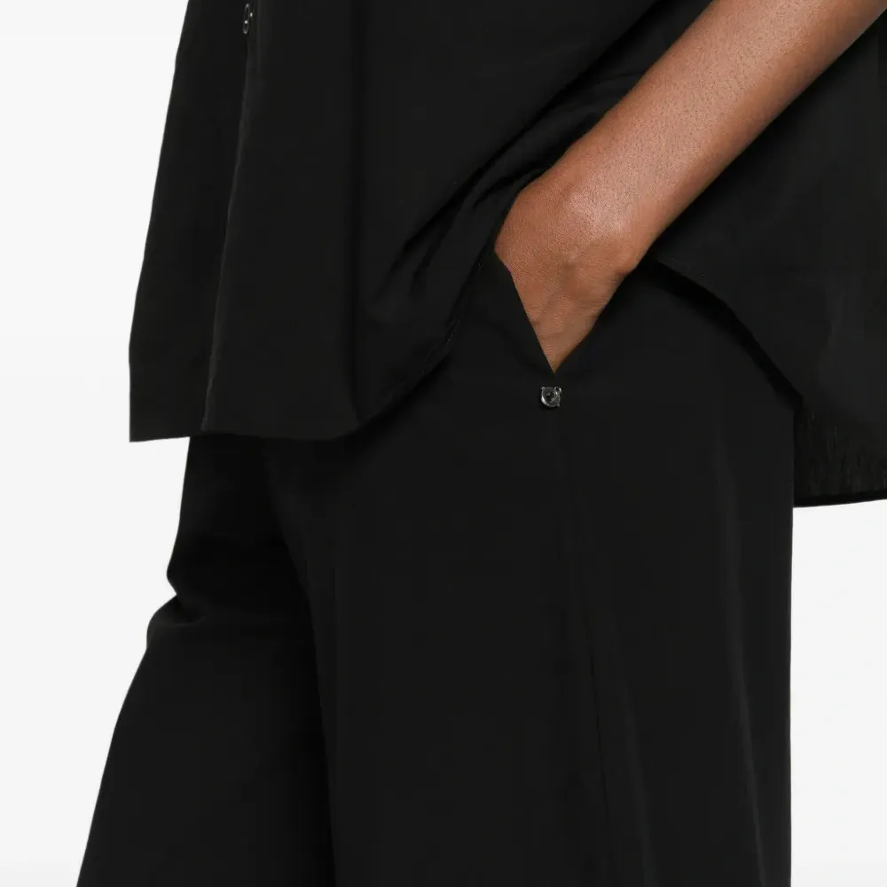 Брюки широкого кроя Брюки широкого кроя