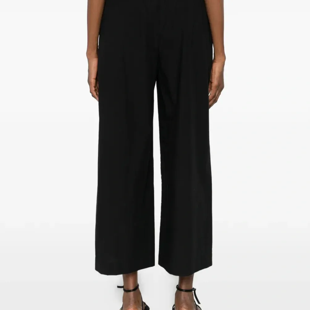 Брюки широкого кроя Брюки широкого кроя