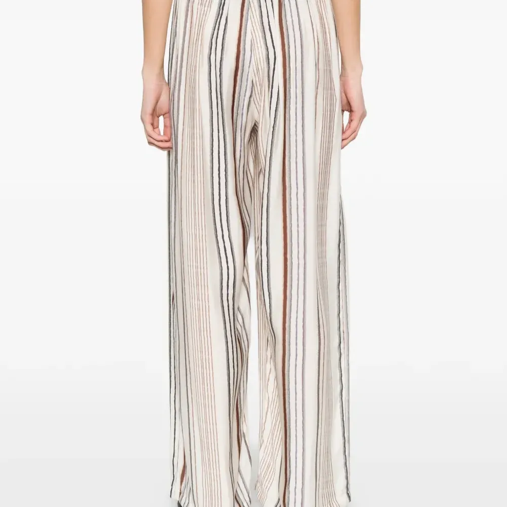 Брюки в полоску