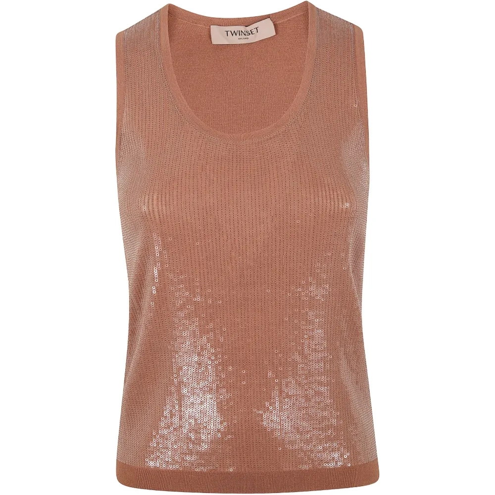 Топ, украшенный пайетками Топ, украшенный пайетками