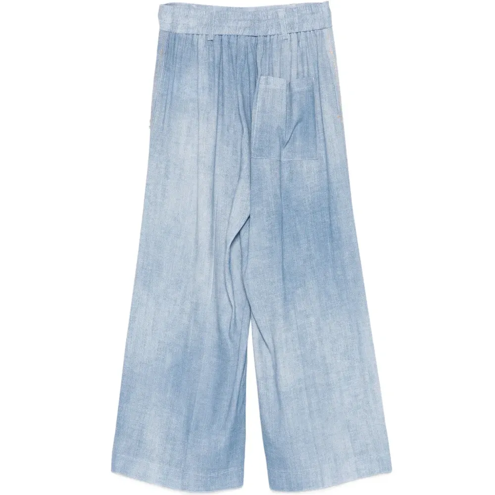 Брюки со складками спереди