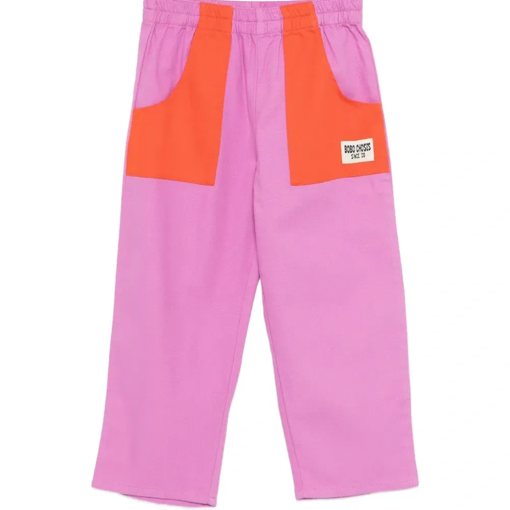 Брюки с карманами и цветными блоками