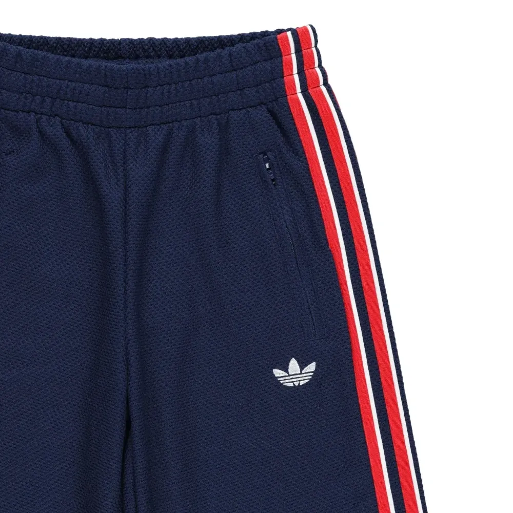 Спортивные брюки с вышитым логотипом