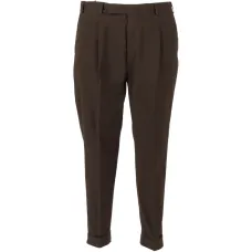 Брюки с защипами и клапанами