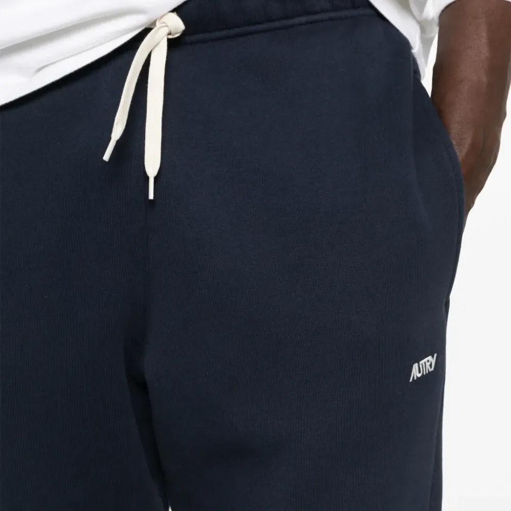 Спортивные брюки с вышитым логотипом