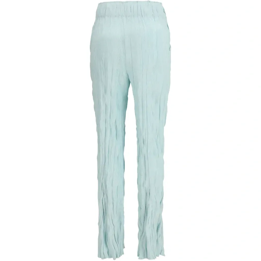 Волнистые брюки с жатым эффектом