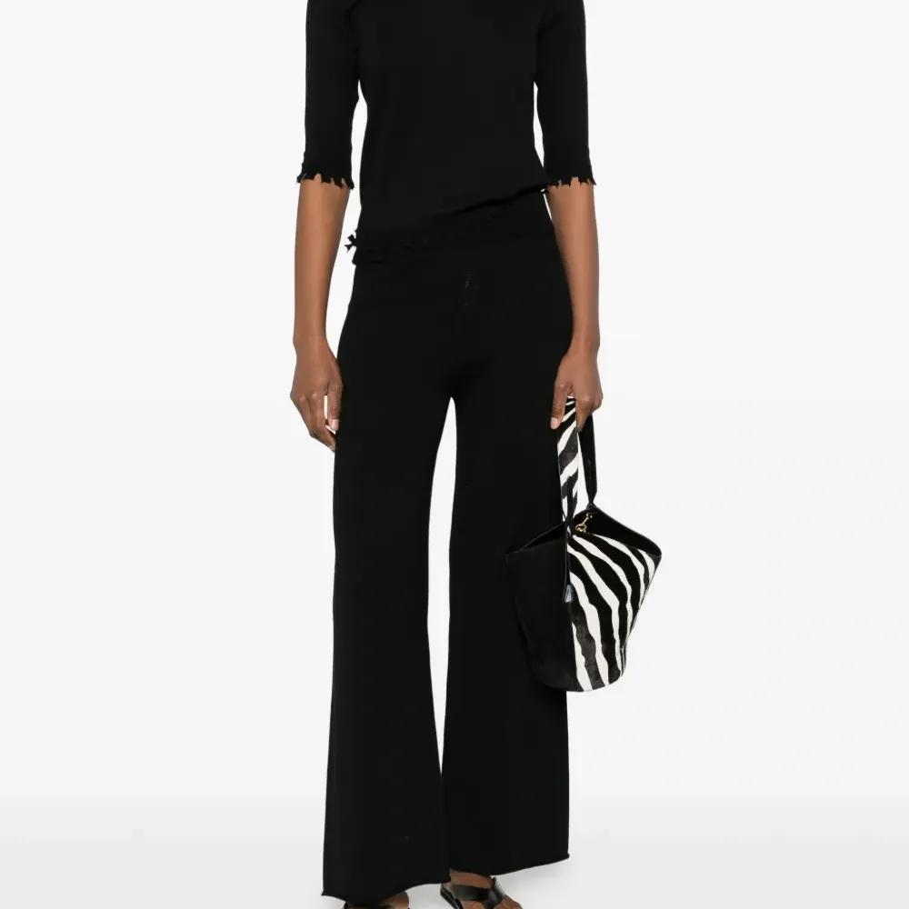 Свитер с короткими рукавами и необработанными краями