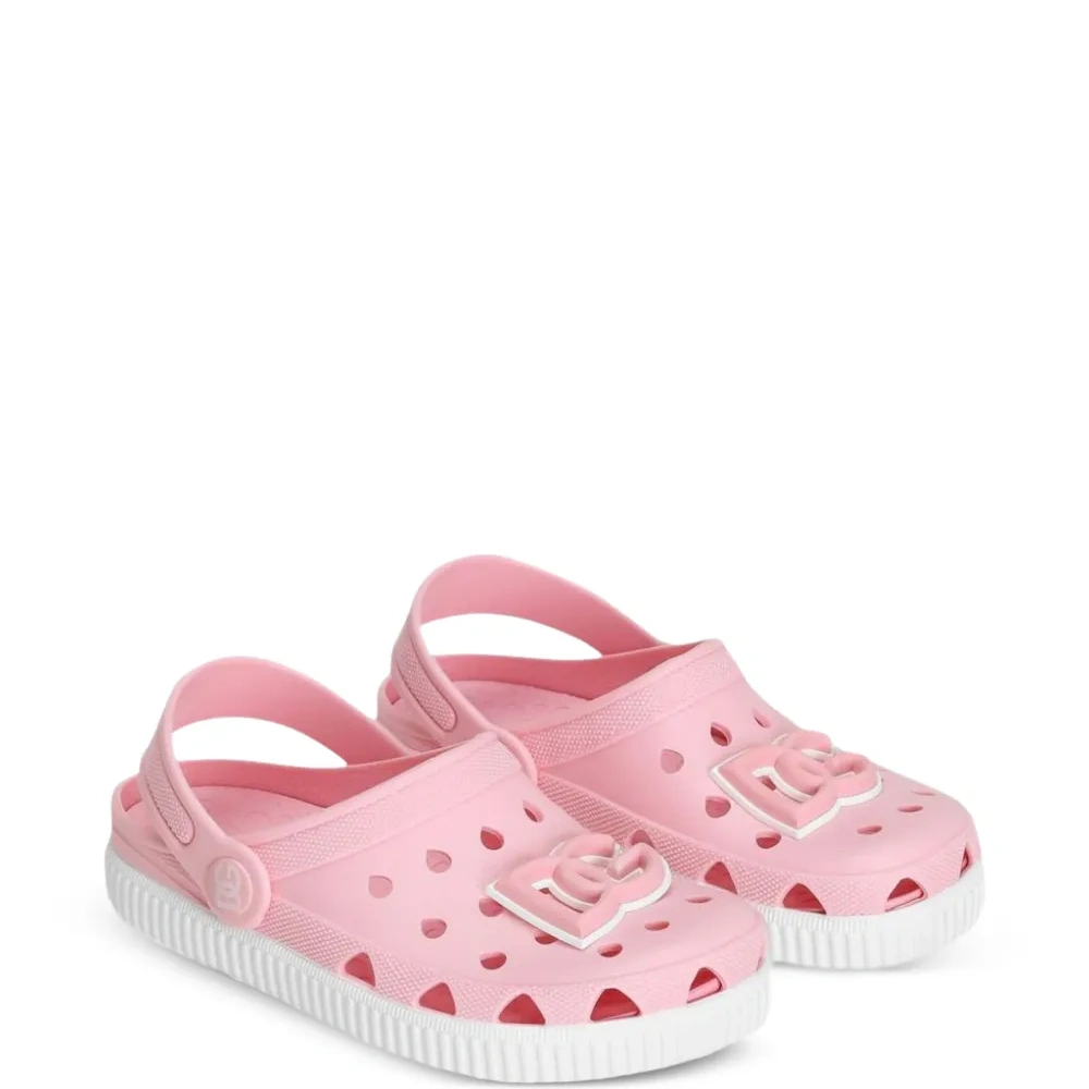 Деревянные сабо с вырезами и нашивкой-логотипом