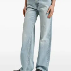 Джинсы с эффектом потертостей Джинсы с эффектом потертостей