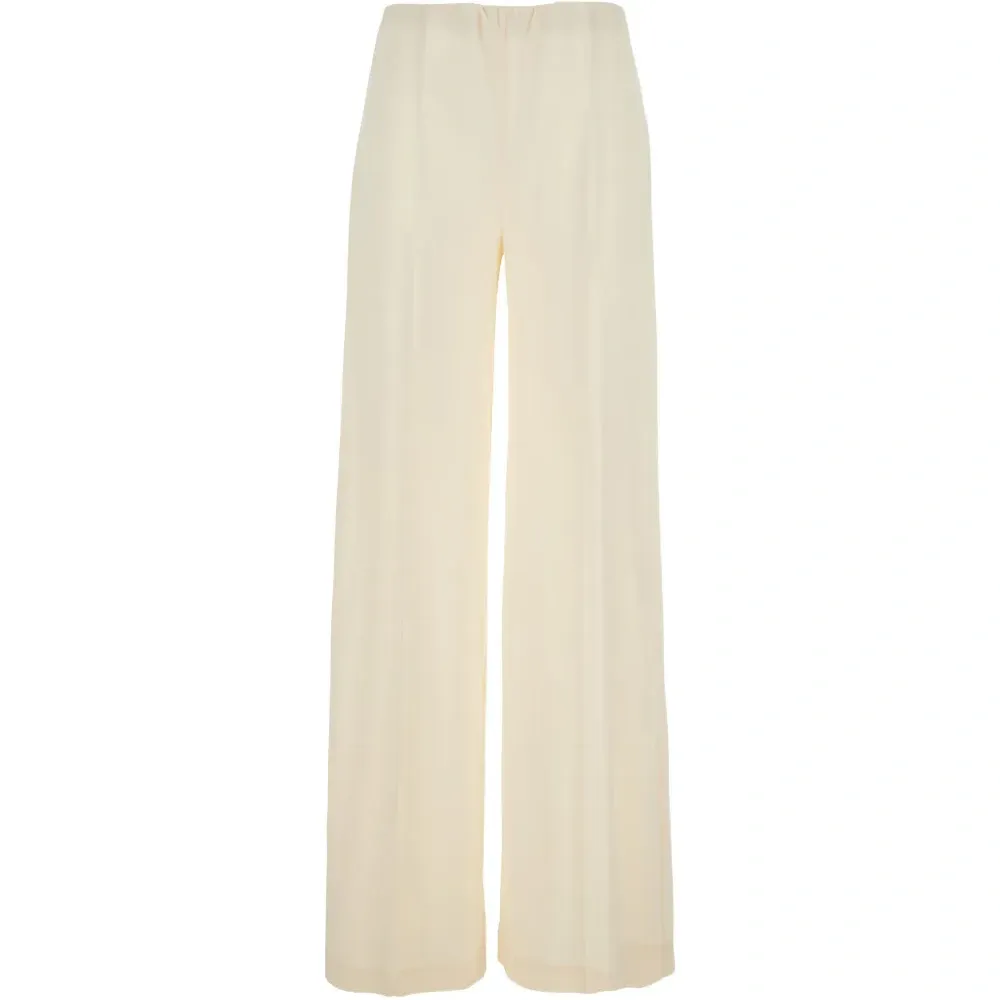 Брюки натурального оттенка свободного кроя