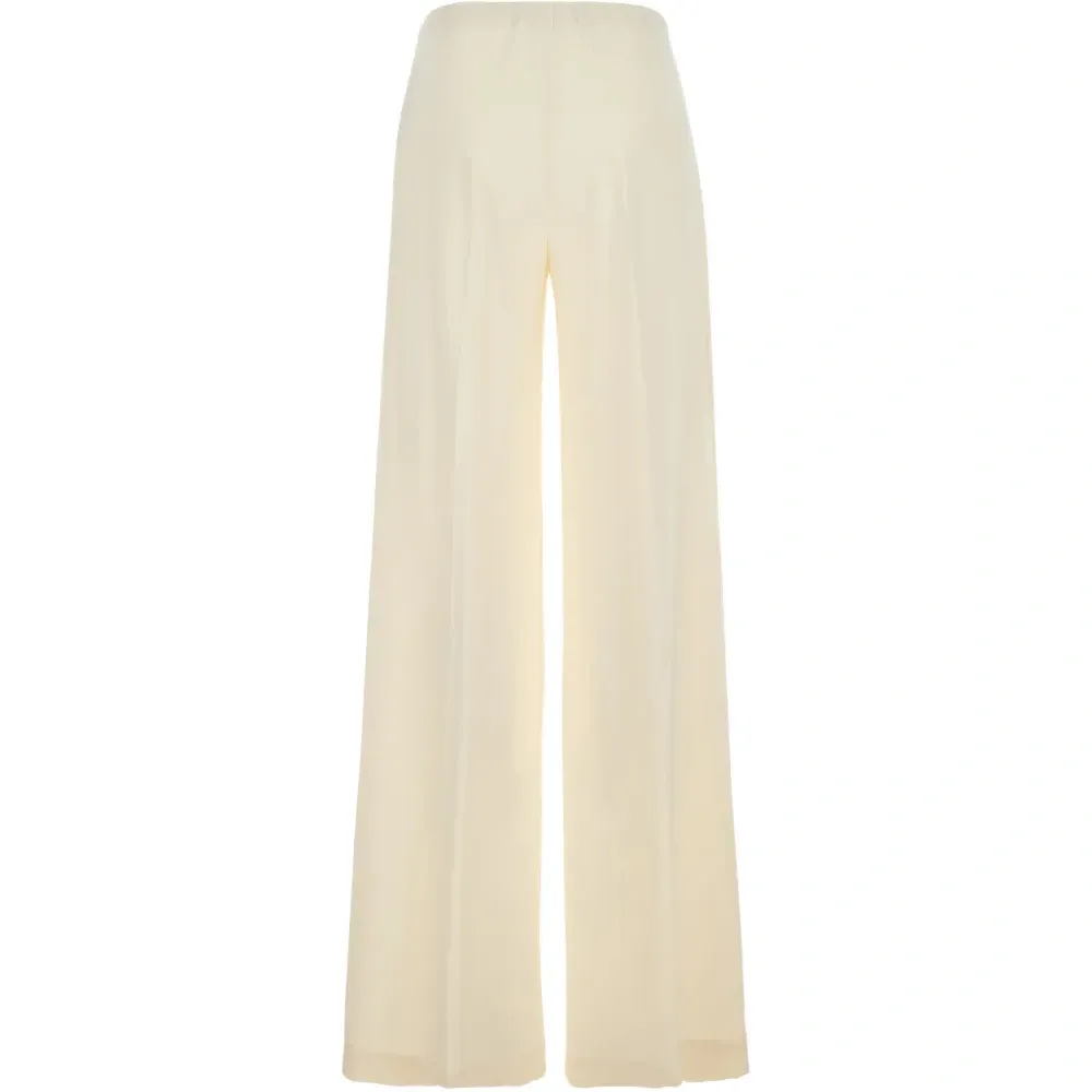 Брюки натурального оттенка свободного кроя