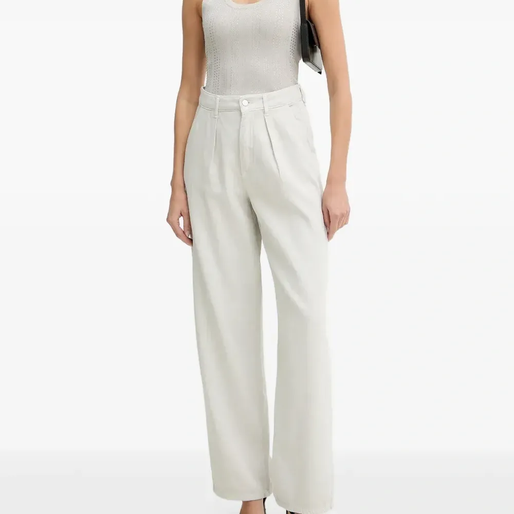 Брюки с декоративными складками