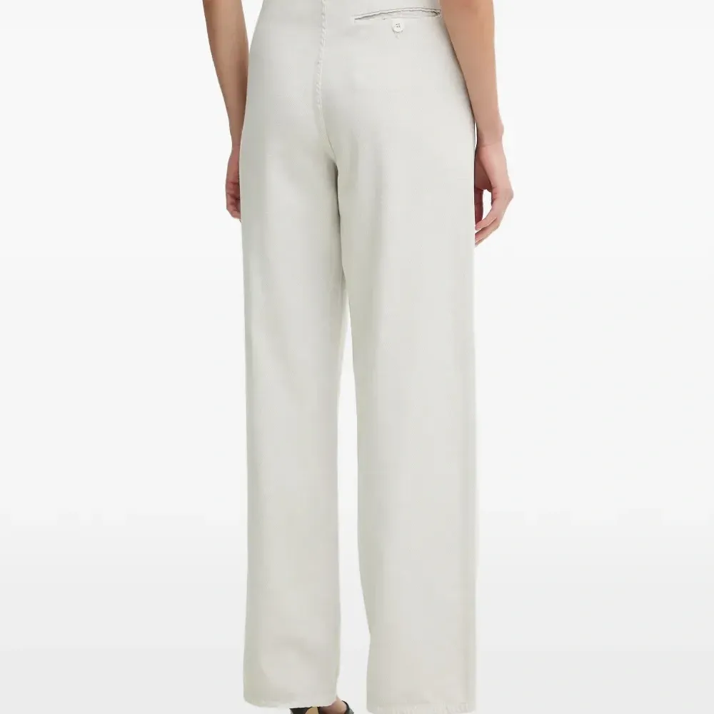 Брюки с декоративными складками