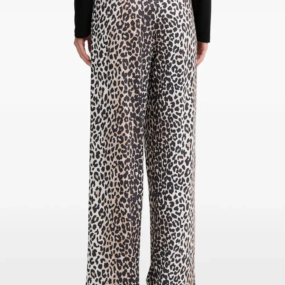 Брюки с завязками и анималистичным принтом