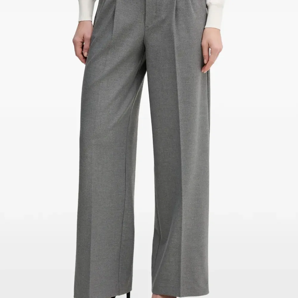 Плиссированные брюки