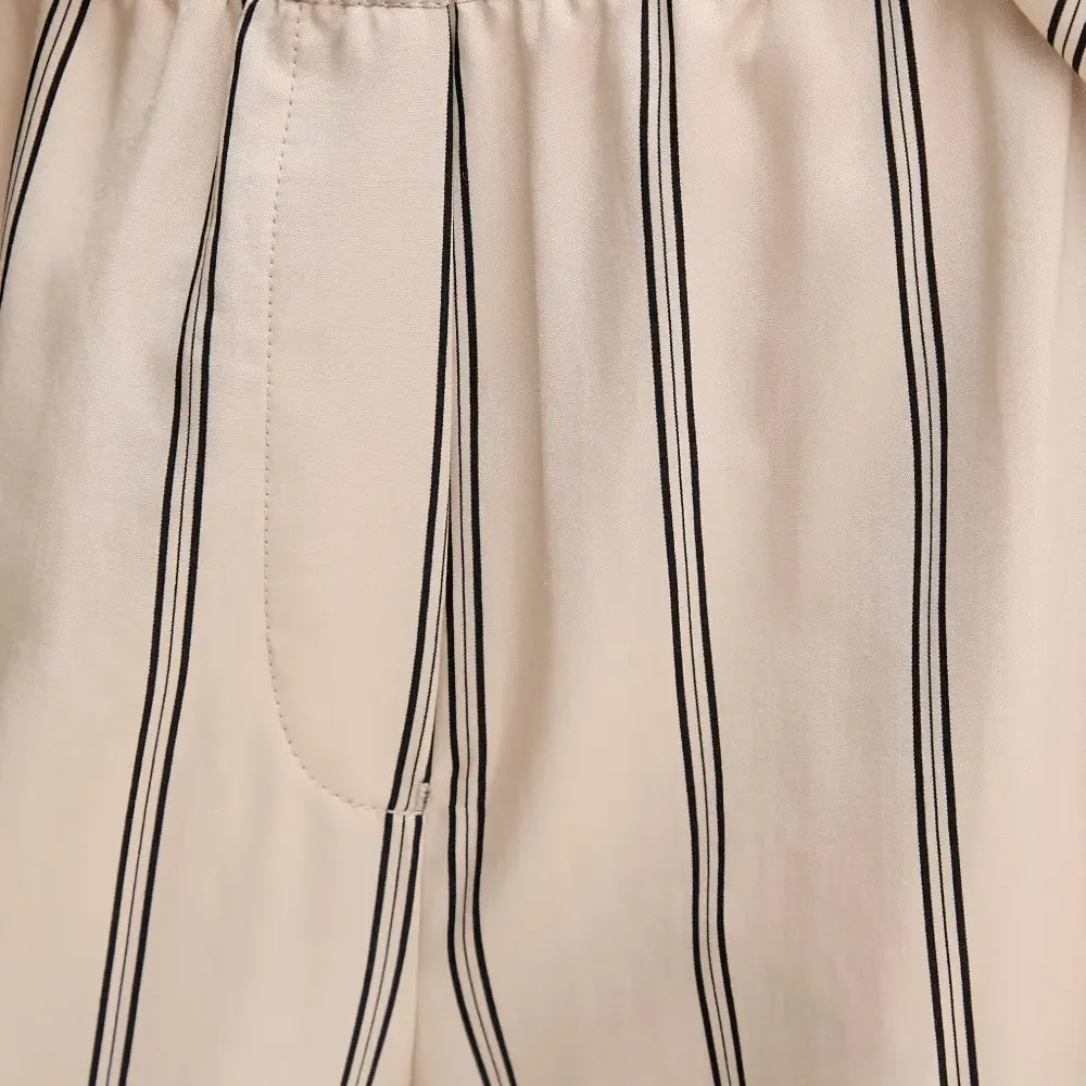 Брюки в полоску