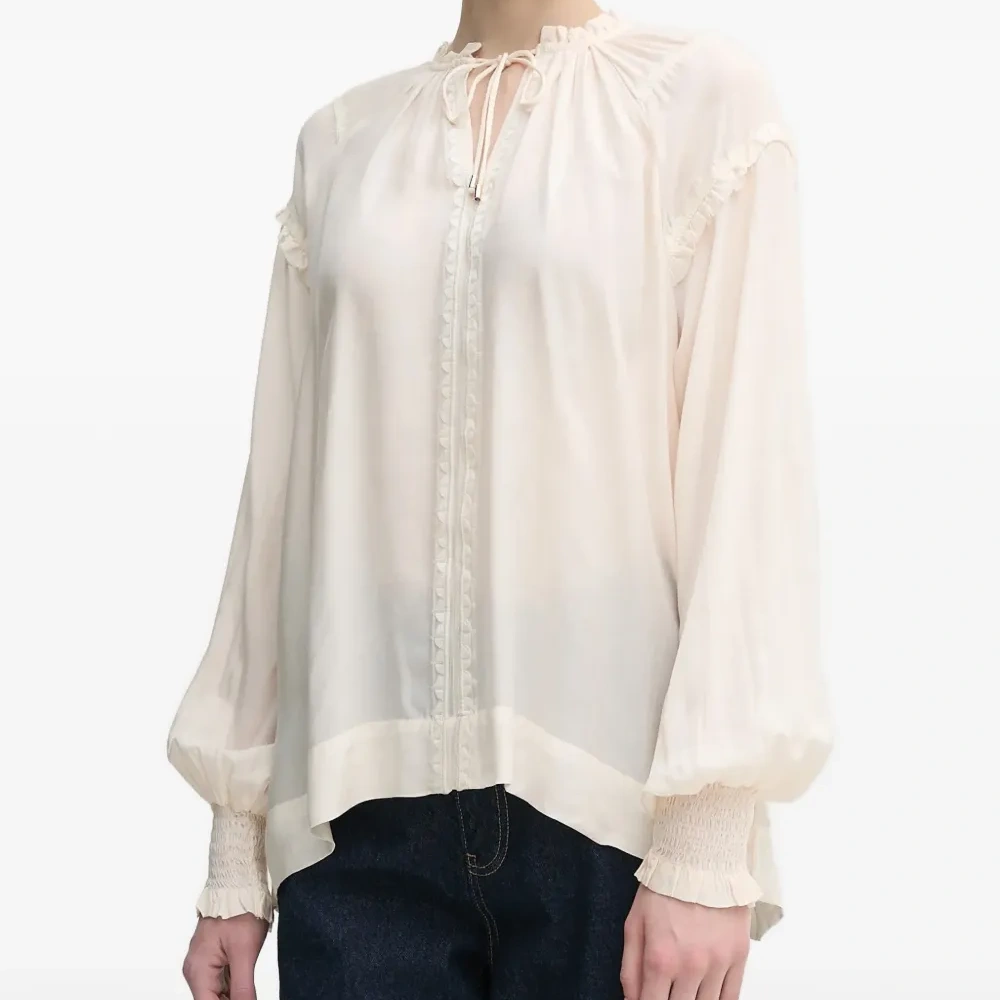 Блузка с длинными рукавами и оборками на манжетах