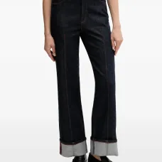 Джинсы с пуговицами на манжетах Джинсы с пуговицами на манжетах