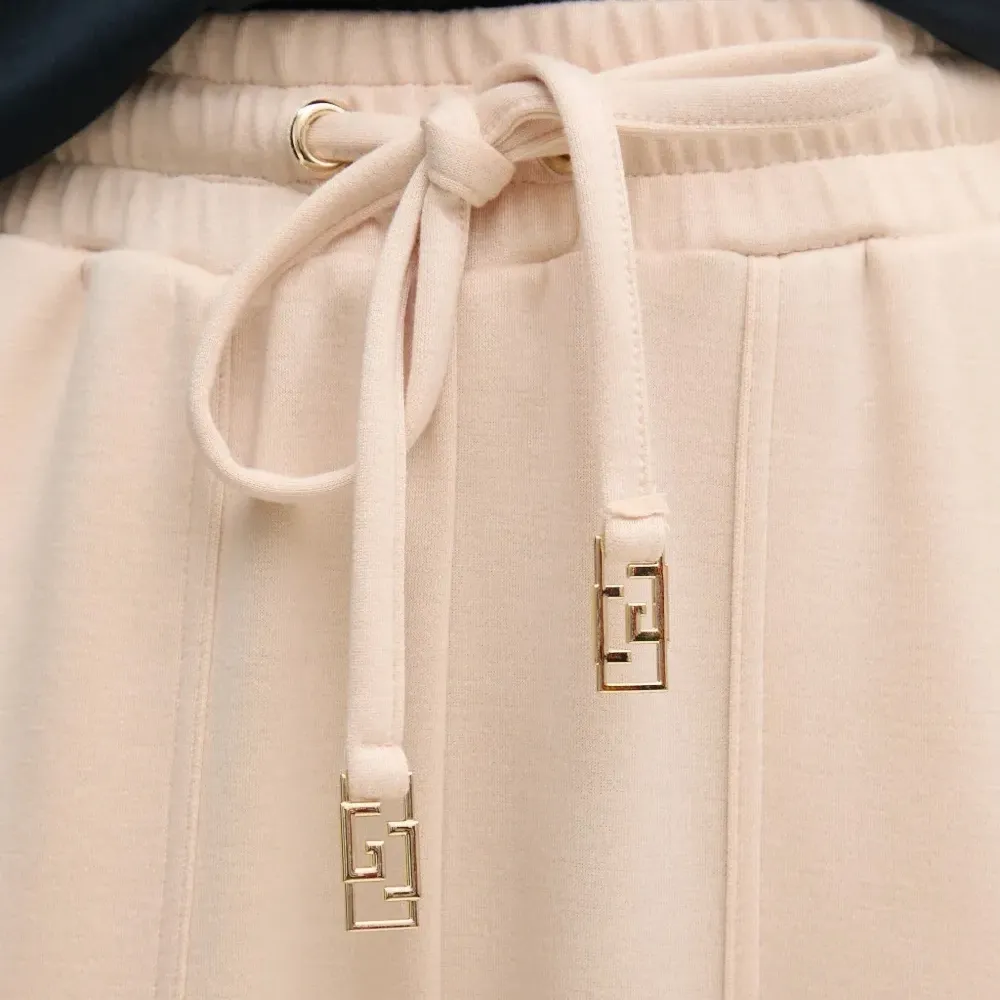 Брюки с накладными карманами и кулиской