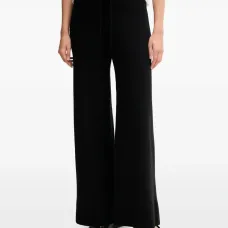 Брюки свободного кроя с поясом на завязке