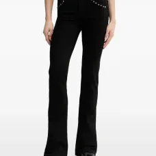 Расклешённые джинсы с отделкой заклёпками