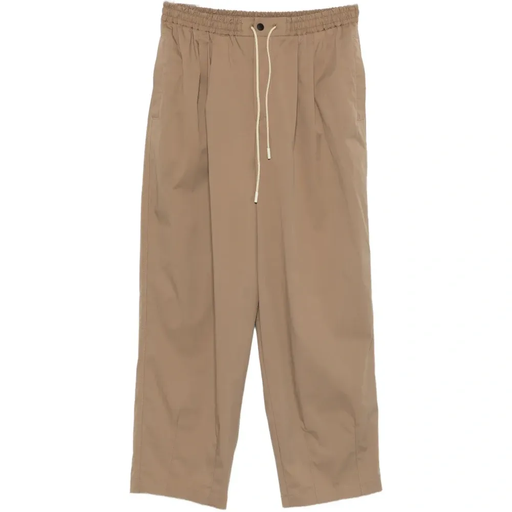 Брюки с защипами