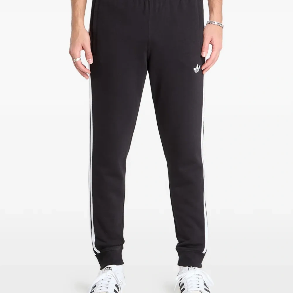 Трикотажные брюки с логотипом и полосатыми деталями