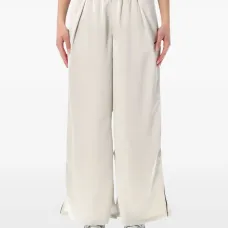 Брюки с вышитым логотипом