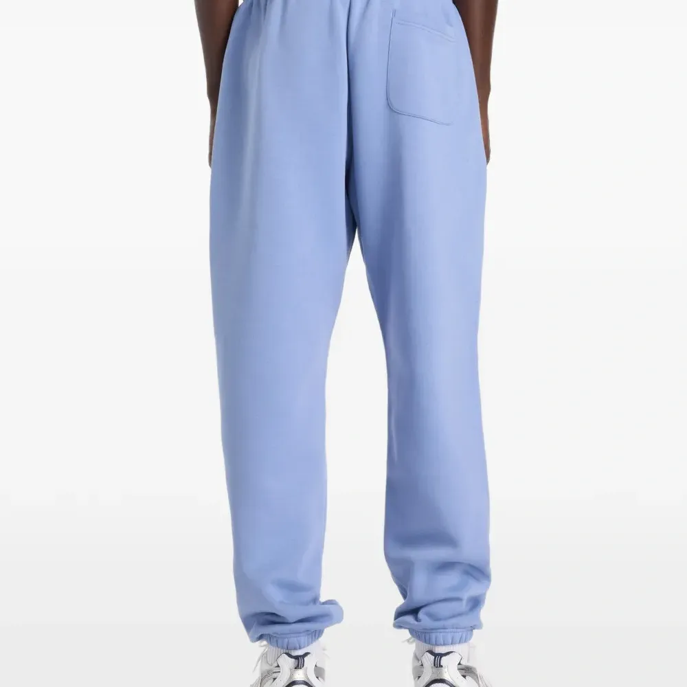 Флисовые спортивные штаны с логотипом и шнурком