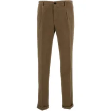 Брюки на пуговицах Брюки на пуговицах