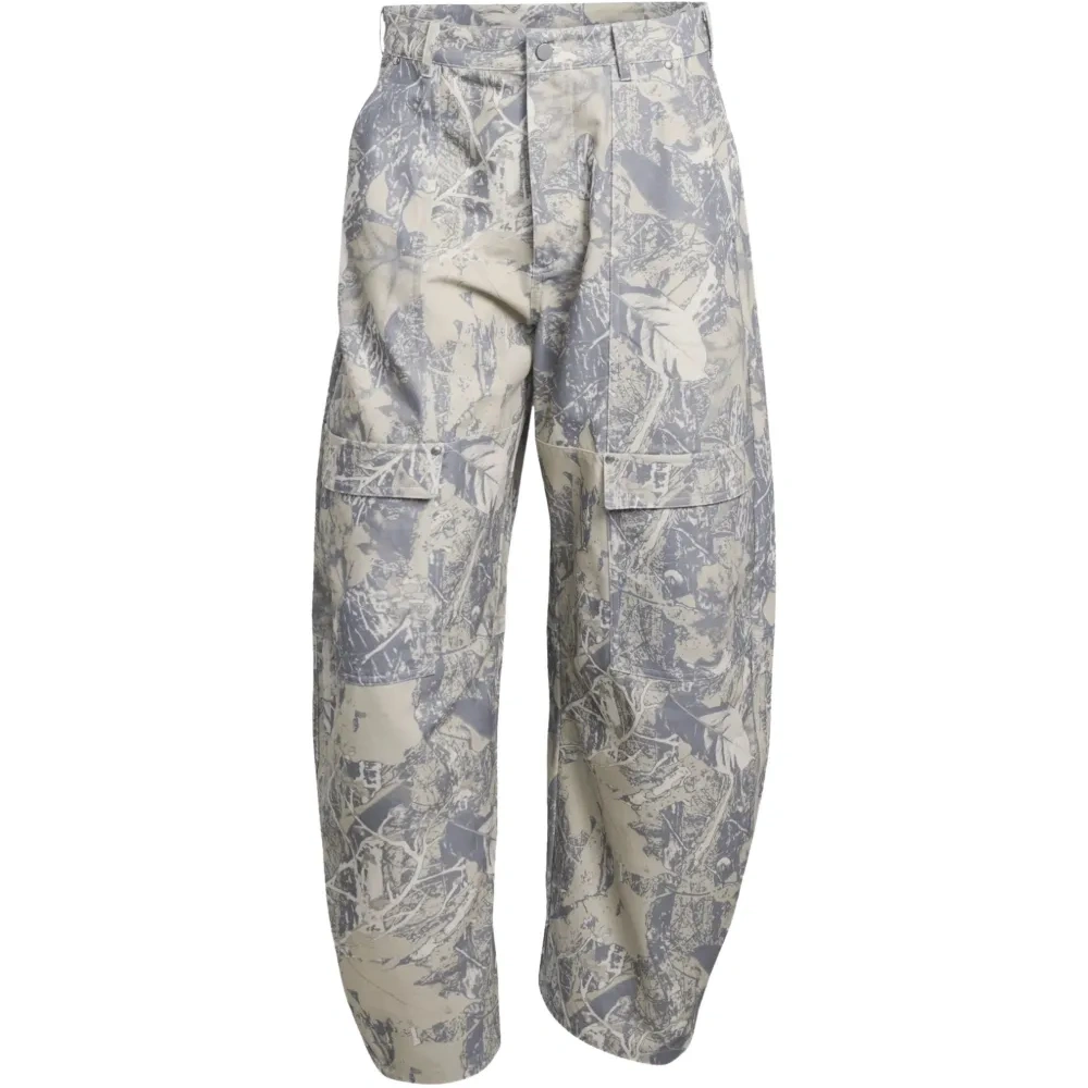 Брюки свободного кроя с клапанами на карманах