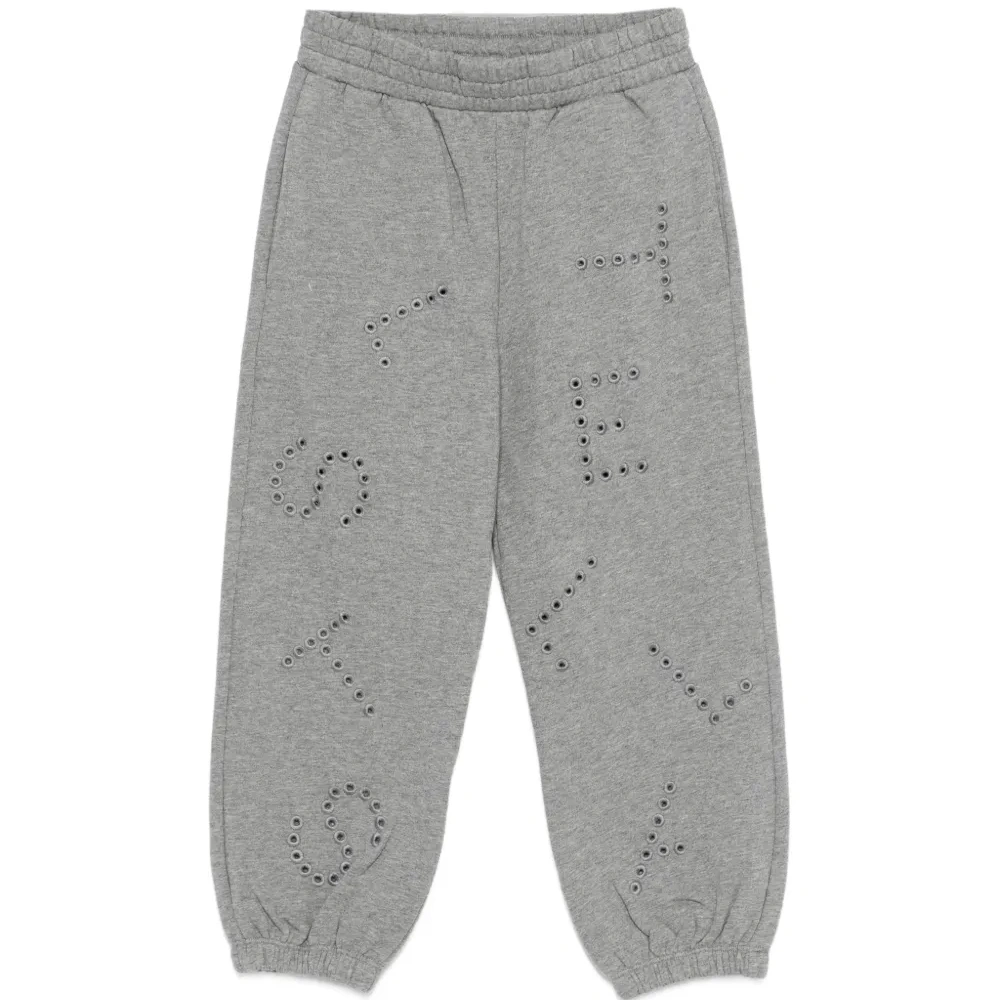 Брюки с люверсами