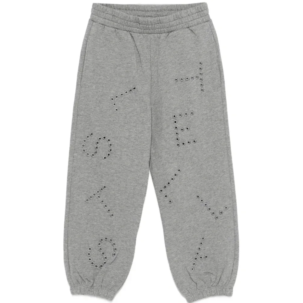 Брюки с люверсами