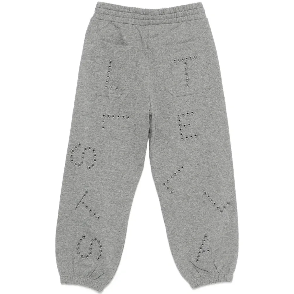 Брюки с люверсами