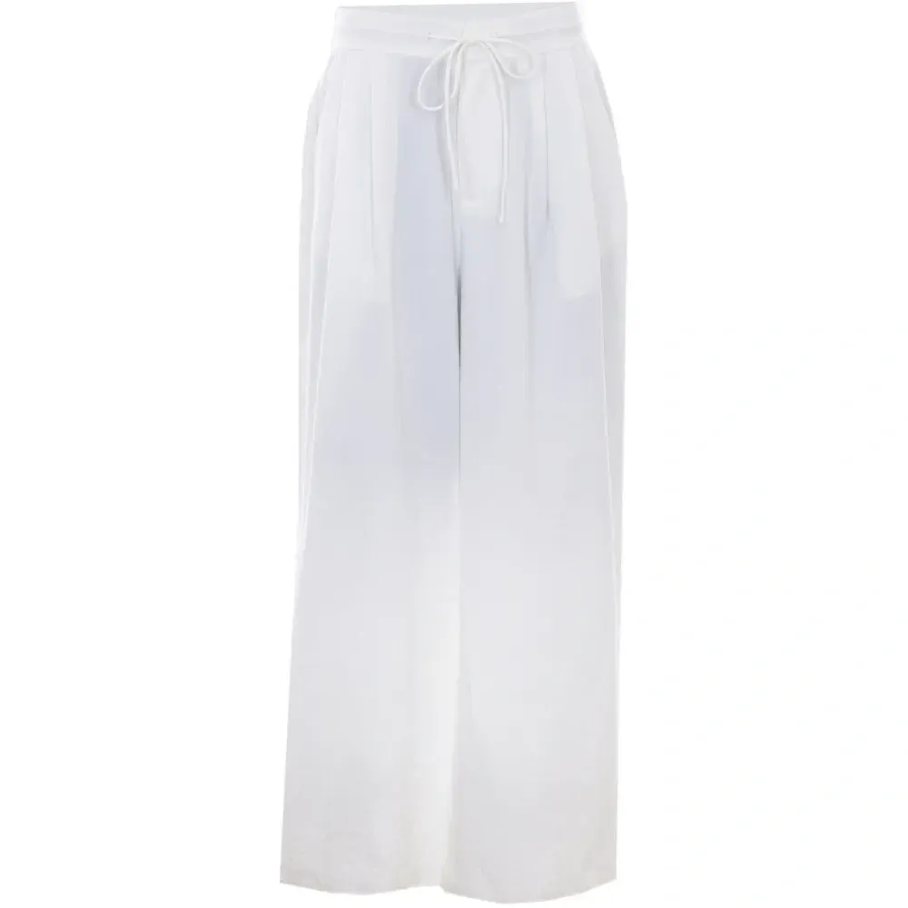 Брюки свободного кроя на завязках