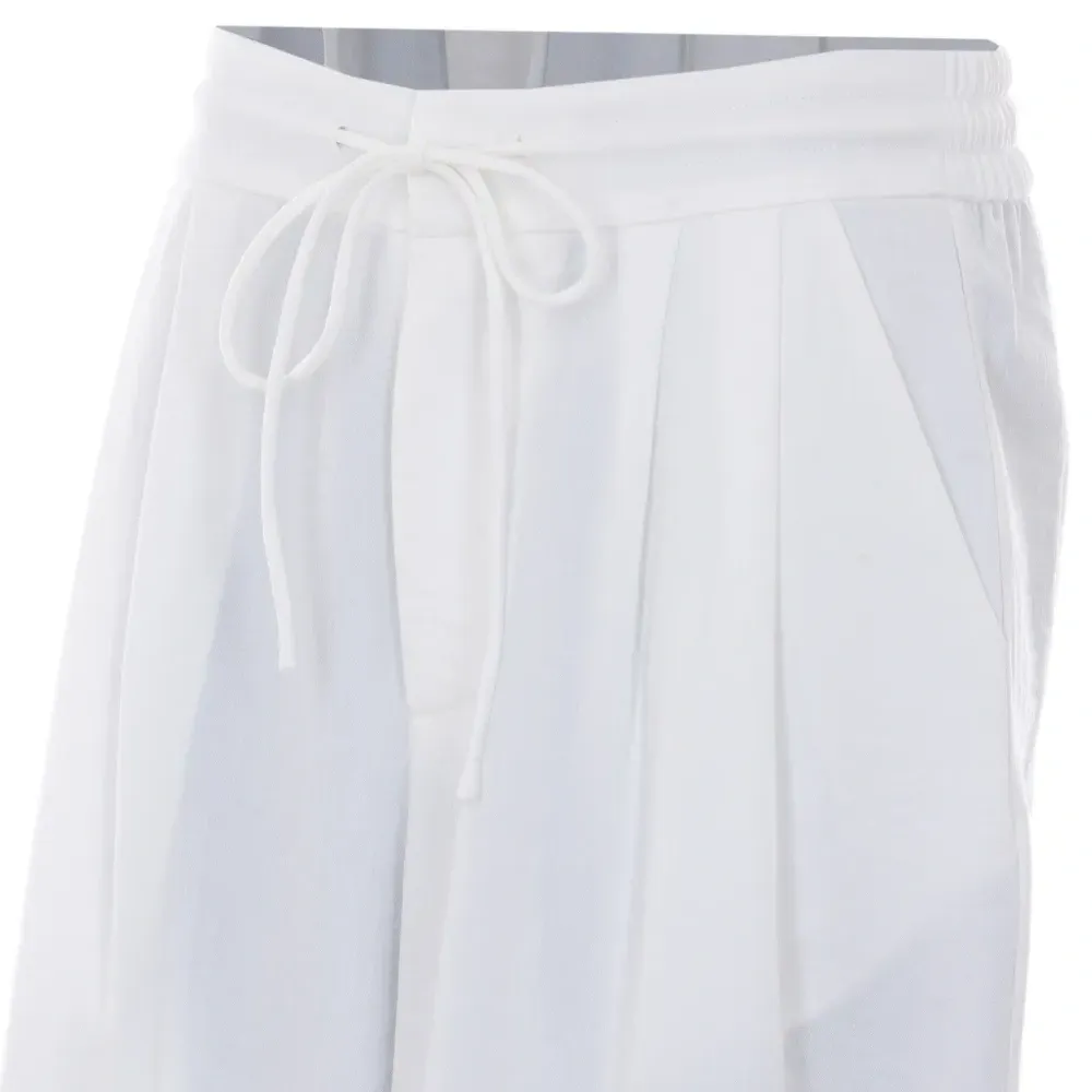 Брюки свободного кроя на завязках