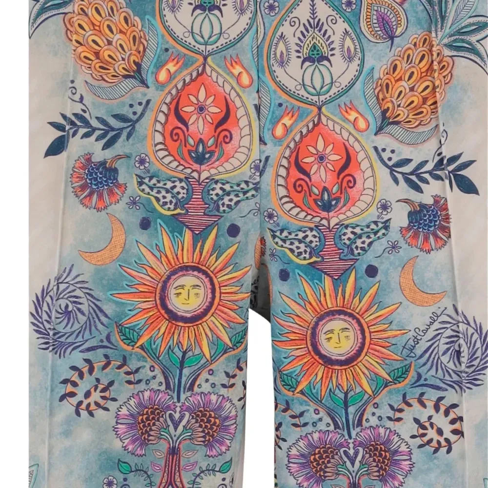 Брюки с боковыми полосами и узором