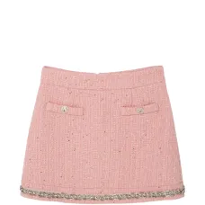 Юбка, украшенная пайетками в виде розеток