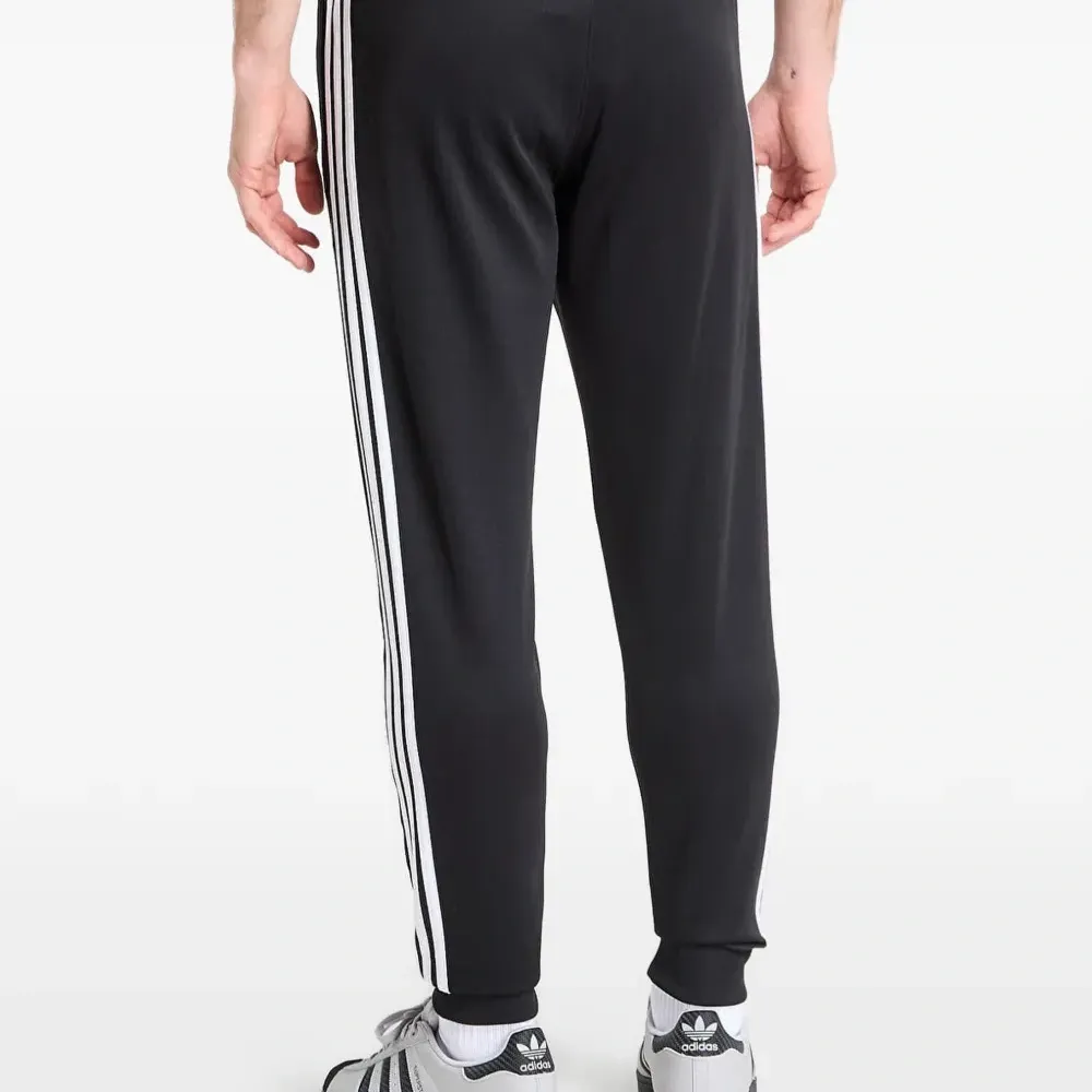 Спортивные брюки SST с тремя полосками