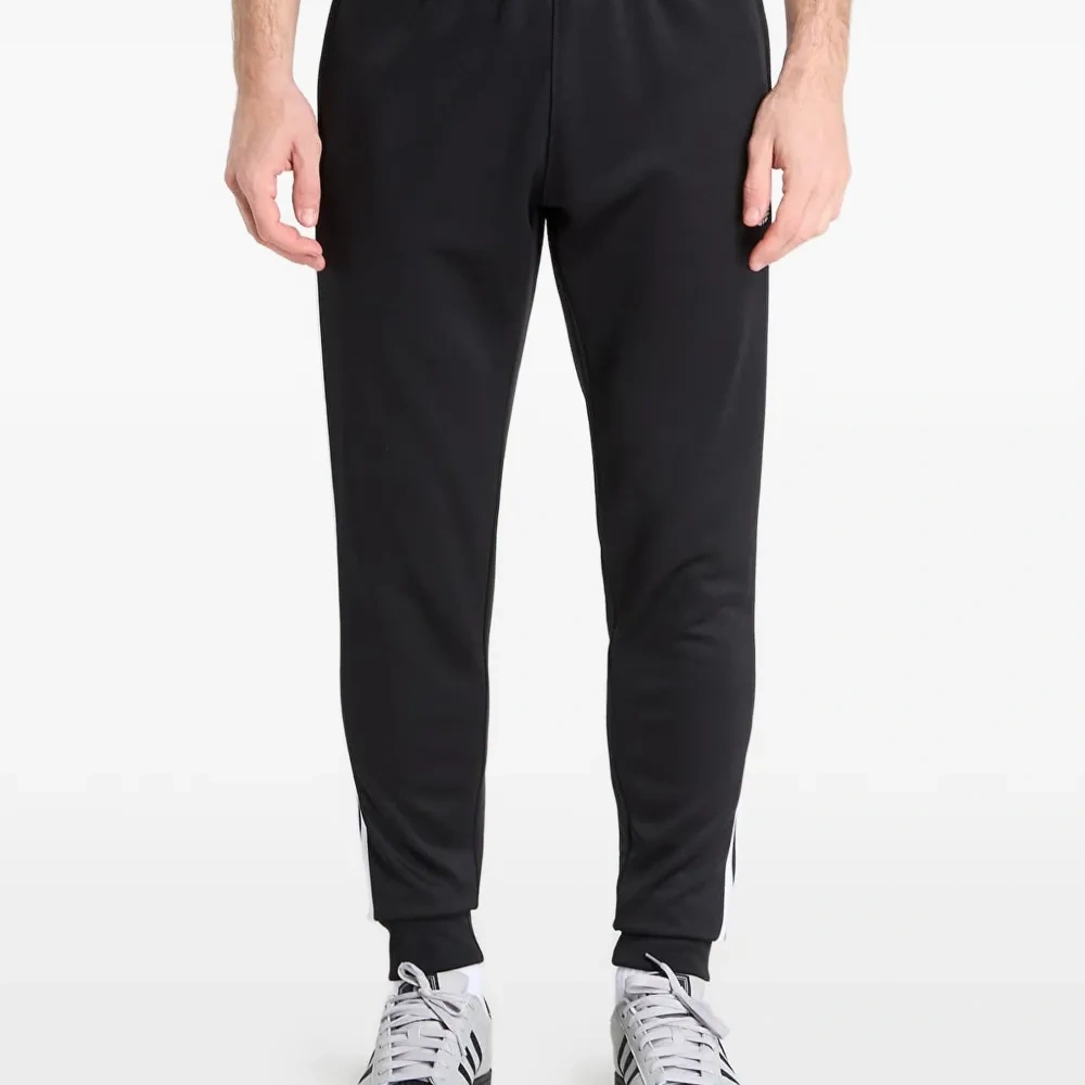 Спортивные брюки SST с тремя полосками