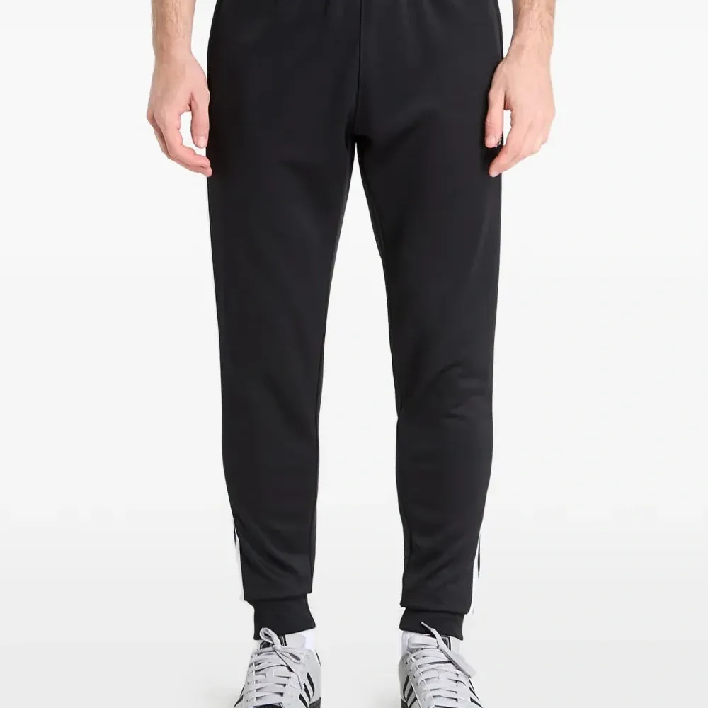 Спортивные брюки SST с тремя полосками