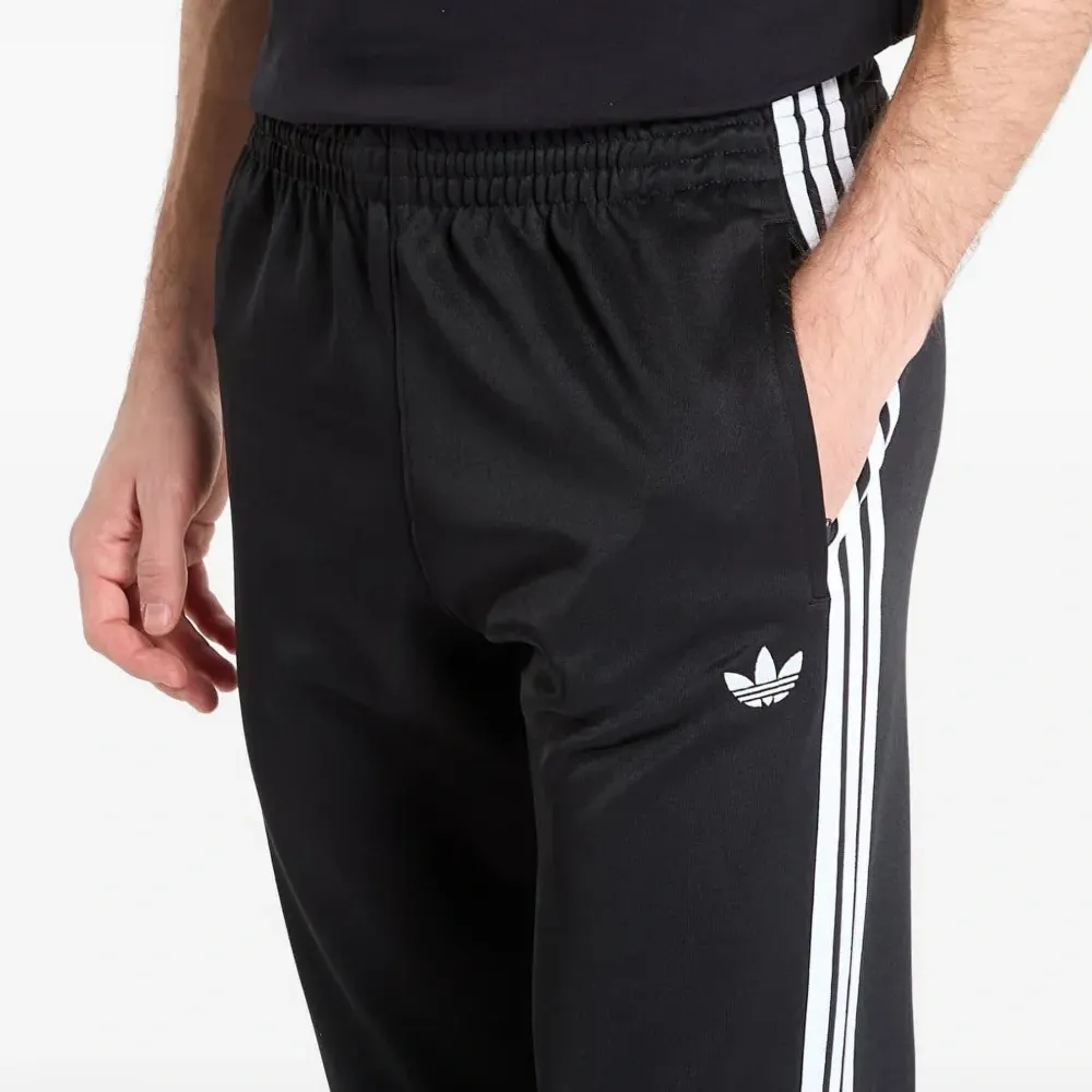 Спортивные брюки SST с тремя полосками